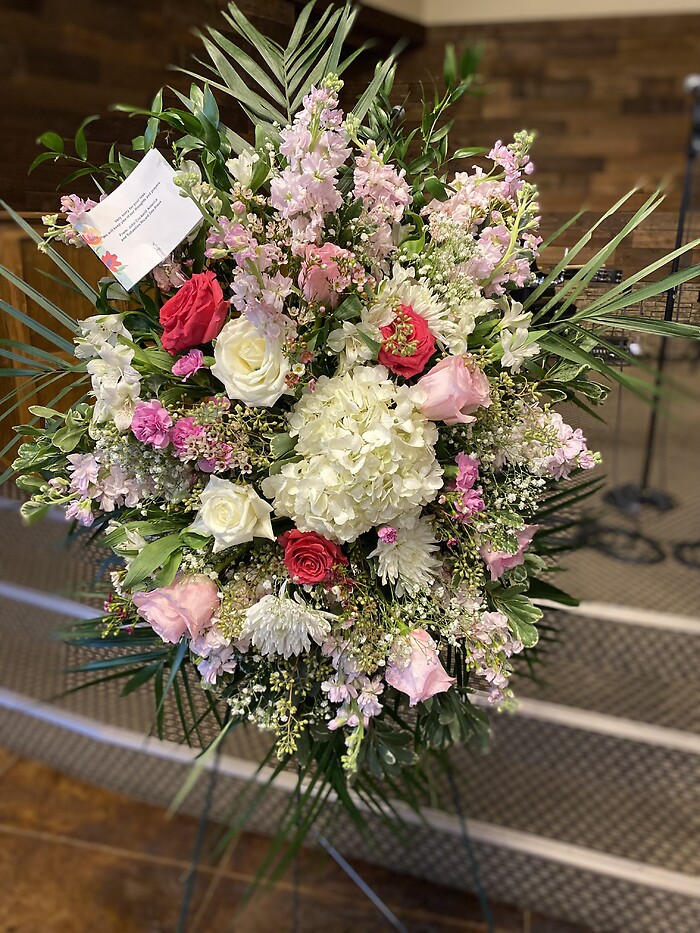 Pink and white funeral standing spray